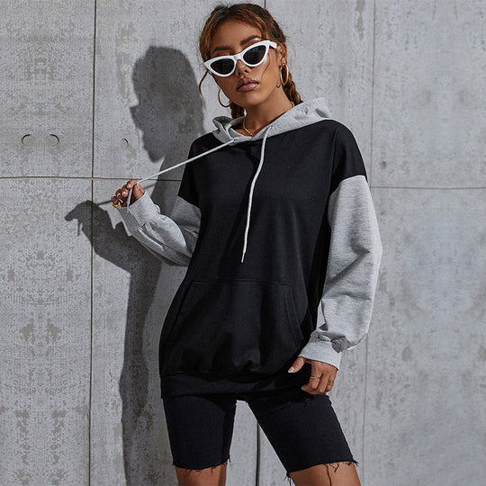Damen Oversize Sweatshirt mit Kapuze, Kontrastärmeln und Kängurutasche Nord Taschen
