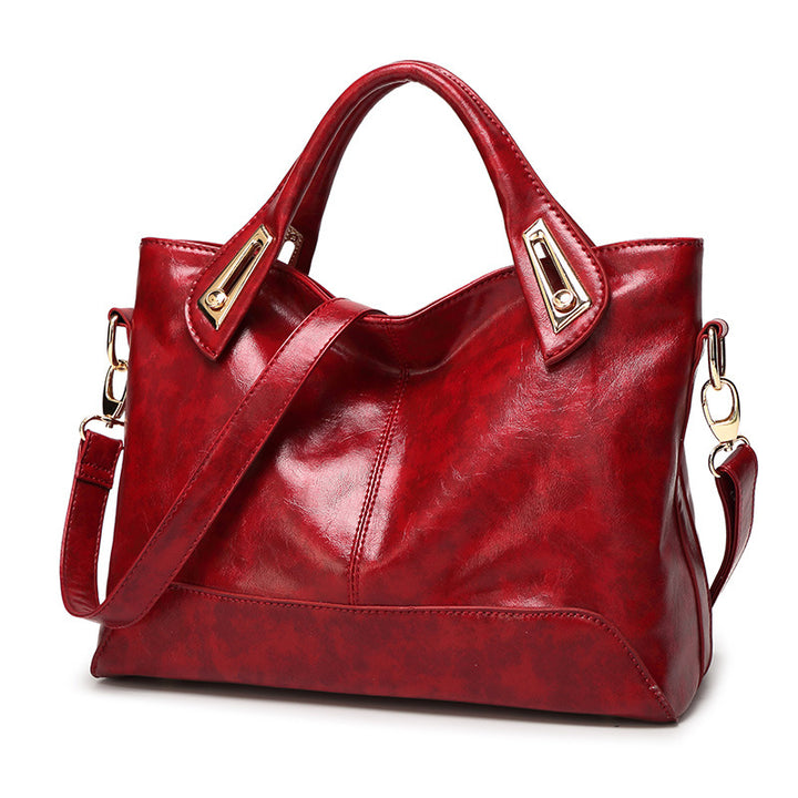 Damen Hobo-Tasche aus glänzendem Kunstleder mit eleganten Metallakzenten Nord Taschen