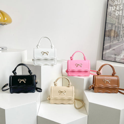 Damen elegante Handtasche mit Wellenstruktur und Schleifendetail Nord Taschen