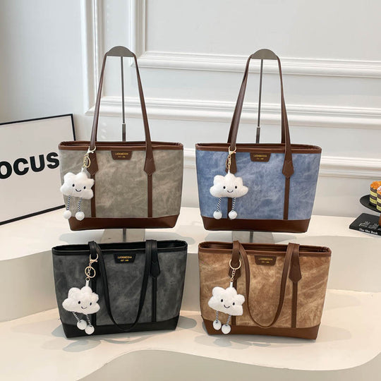 Damen elegante Tragetasche mit verspieltem Anhänger Nord Taschen