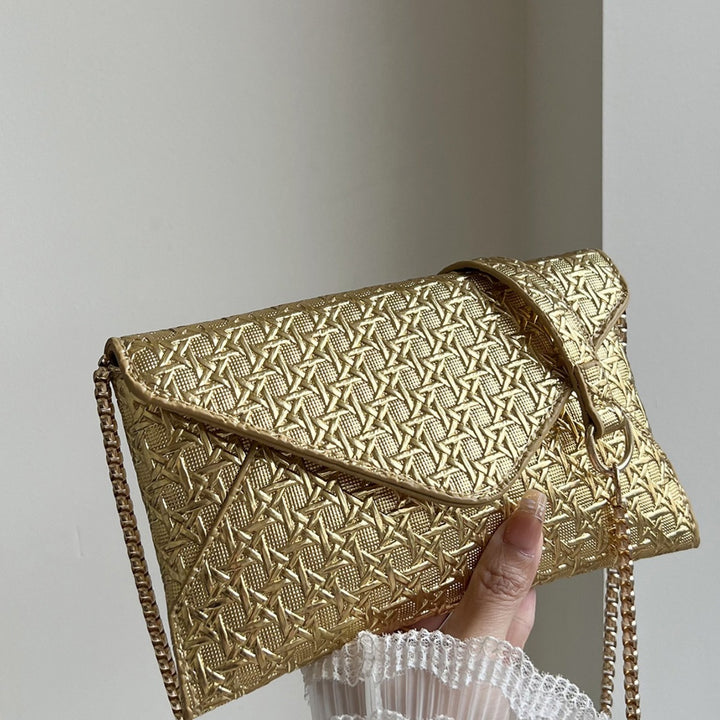 Damen Umhängetasche mit strukturiertem Design und goldenen Akzenten Nord Taschen