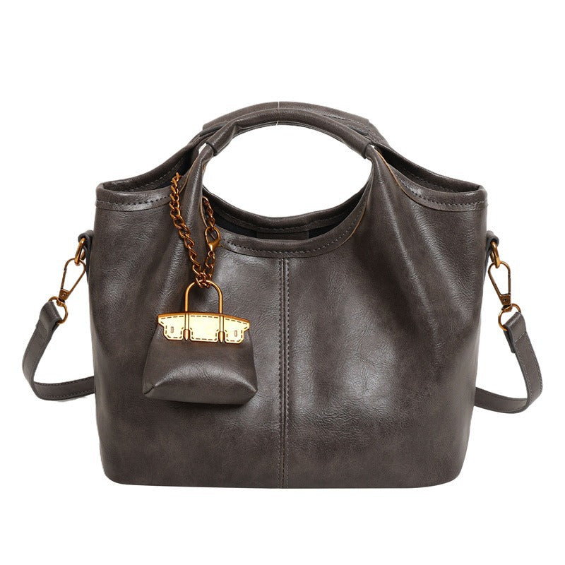 Damen elegante Handtasche mit abnehmbarem Charm Nord Taschen