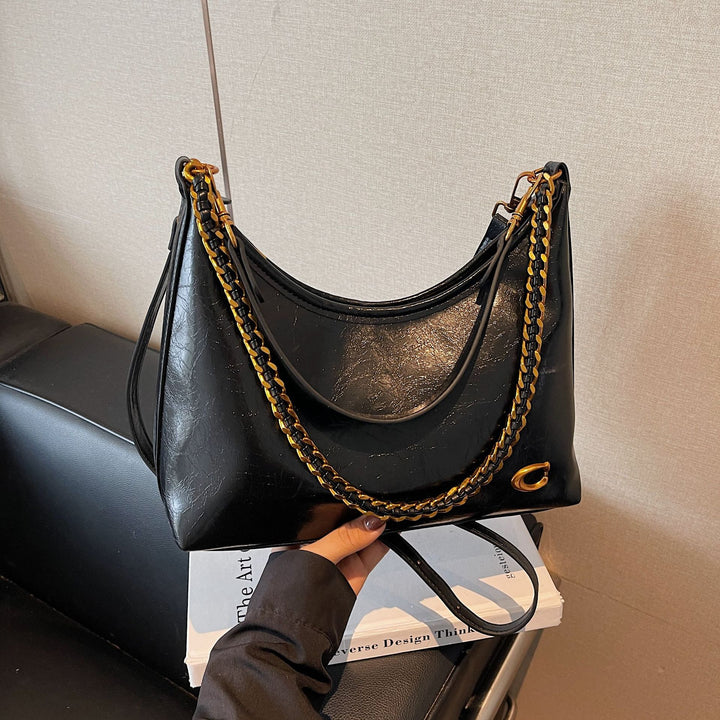 Damen elegante Handtasche mit Kettenakzenten Nord Taschen