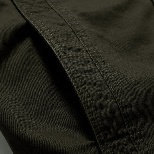 Herren Urbaner Canvas‑Militärblouson mit hohem Kragen, Schulterepauletten und Multifunktions‑Taschen Nord Taschen