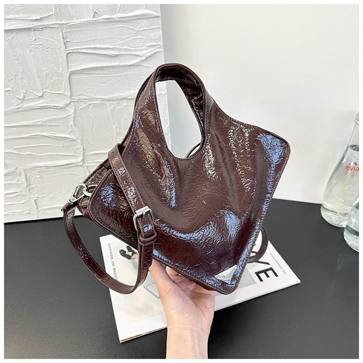 Damen stilvolle Handtasche aus glänzendem Kunstleder Nord Taschen