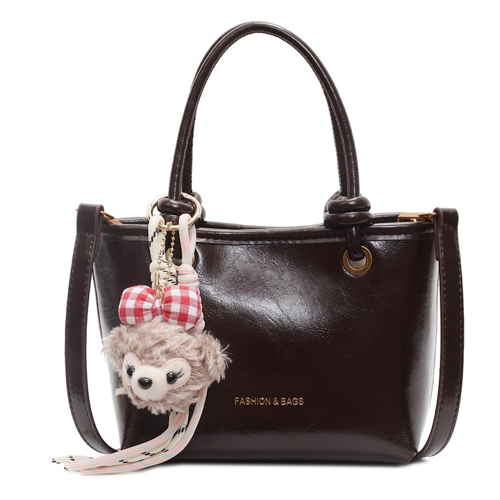 Damen Modische Handtasche mit verspieltem Tieranhänger Nord Taschen