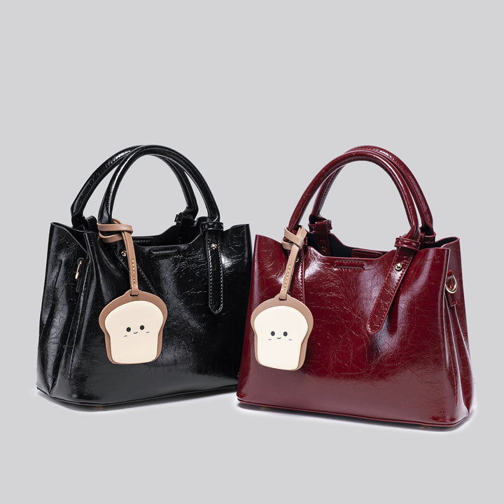 Damen modische Handtasche mit verspieltem Anhänger Nord Taschen