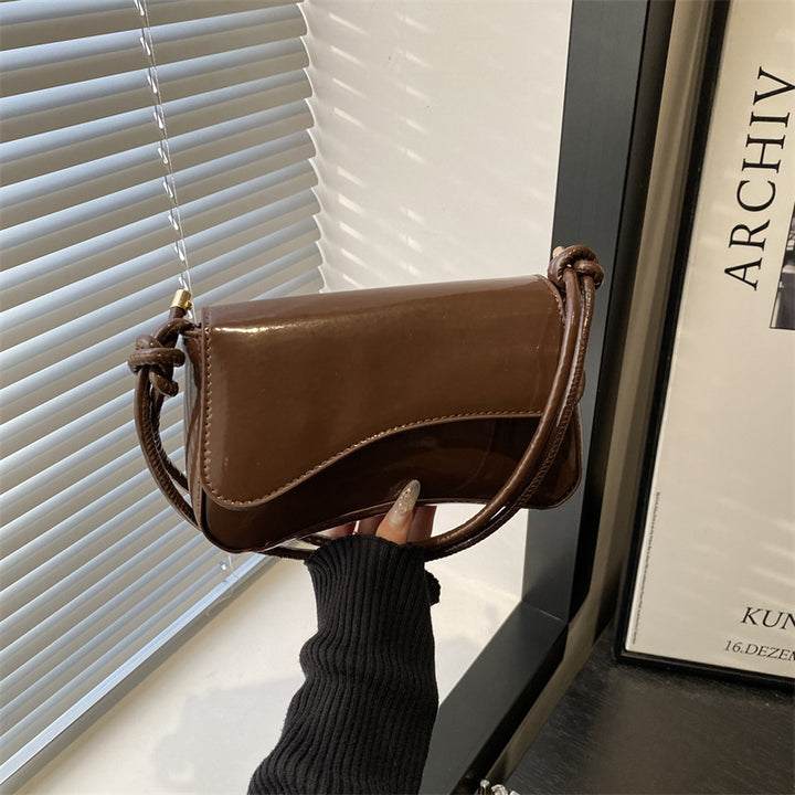 Damen elegante Handtasche mit geschwungenem Design Nord Taschen