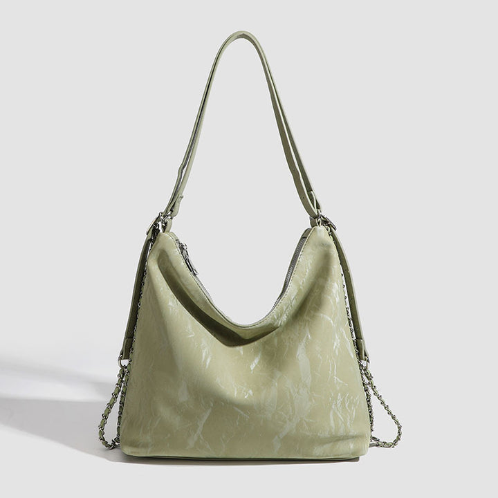 Damen Hobo-Tasche mit großzügigem Innenraum und eleganter Kettenapplikation Nord Taschen