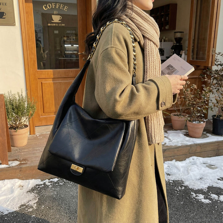 Damen Umhängetasche mit elegantem Kettenriemen Nord Taschen