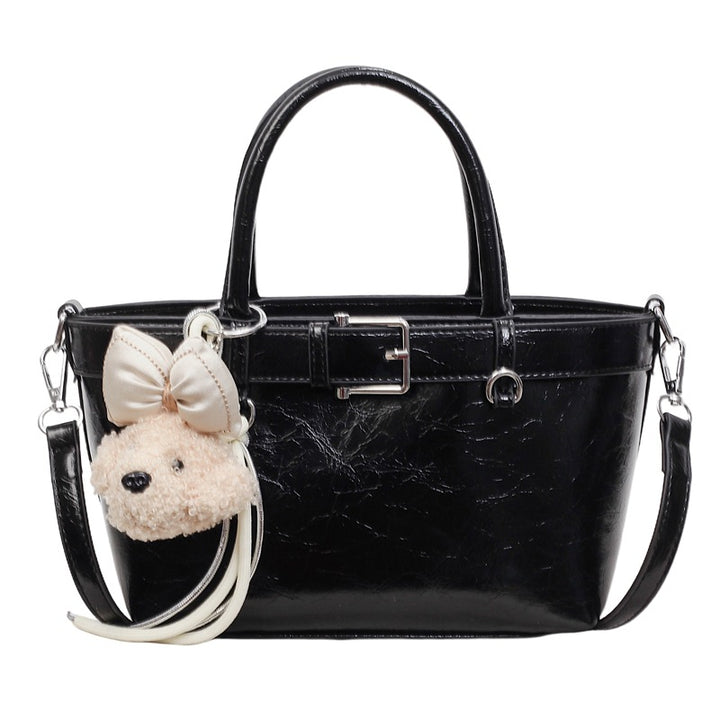 Damen Handtasche mit plüschigem Tieranhänger Nord Taschen