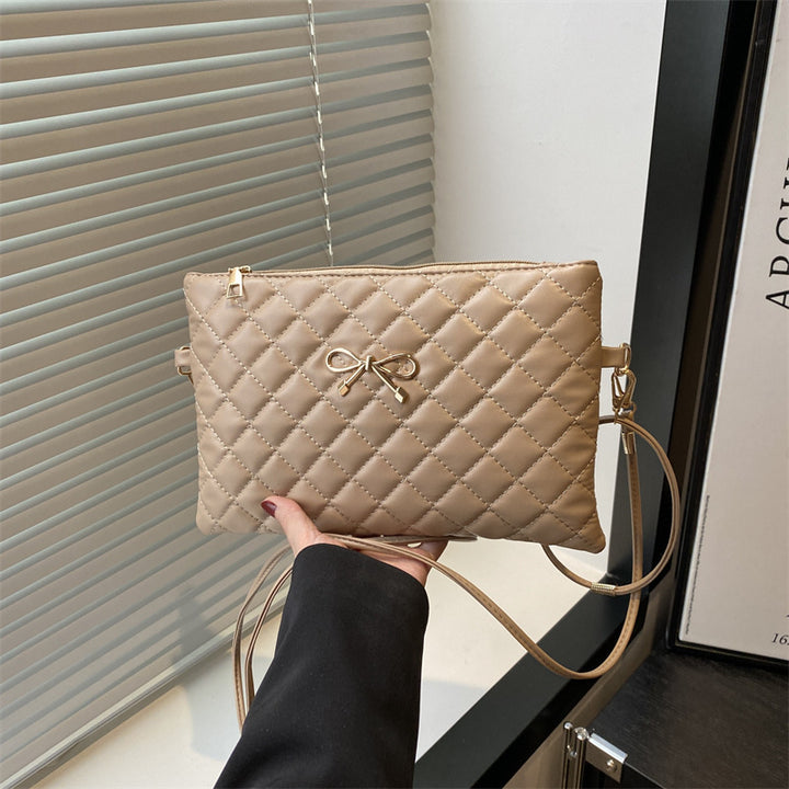 Damen elegante Clutch mit elegantem Steppmuster und zierlichem Schleifenakzent Nord Taschen