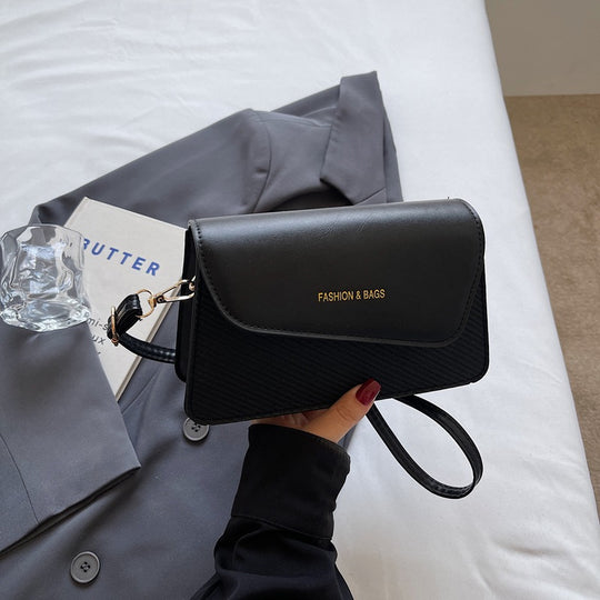 Damen Umhängetasche im stilvollen Kombi-Design mit hochwertigem Leder und gewebtem Stoff Nord Taschen