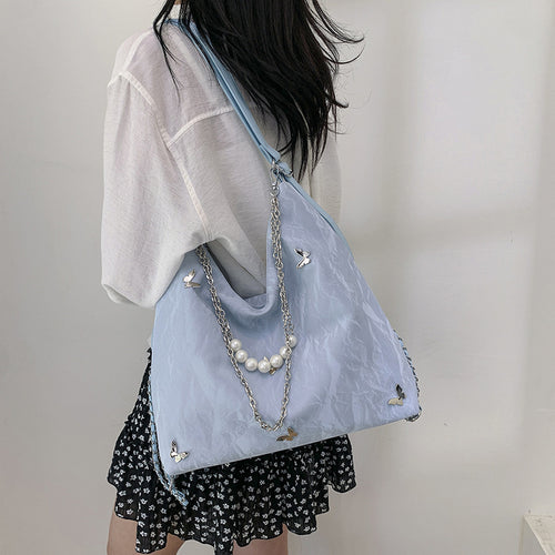 Damen Schultertasche mit modischen Ketten- und Perlendetails | Nord Taschen