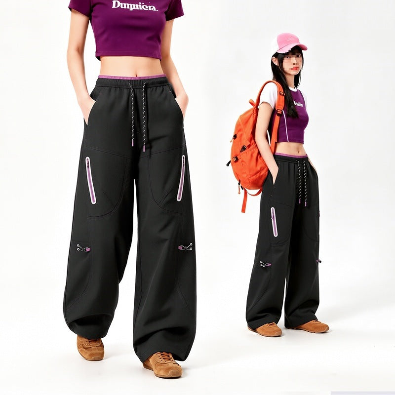 Damen Oversize Tech-Loungehose mit Kontrastnähten, reflektierenden Reißverschlusstaschen & Kordelbund Nord Taschen