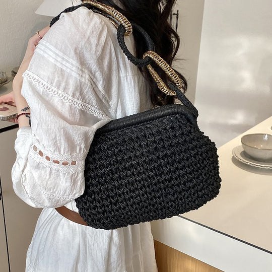 Damen-Handtasche aus geflochtenem Material mit dekorativen Griffen Nord Taschen
