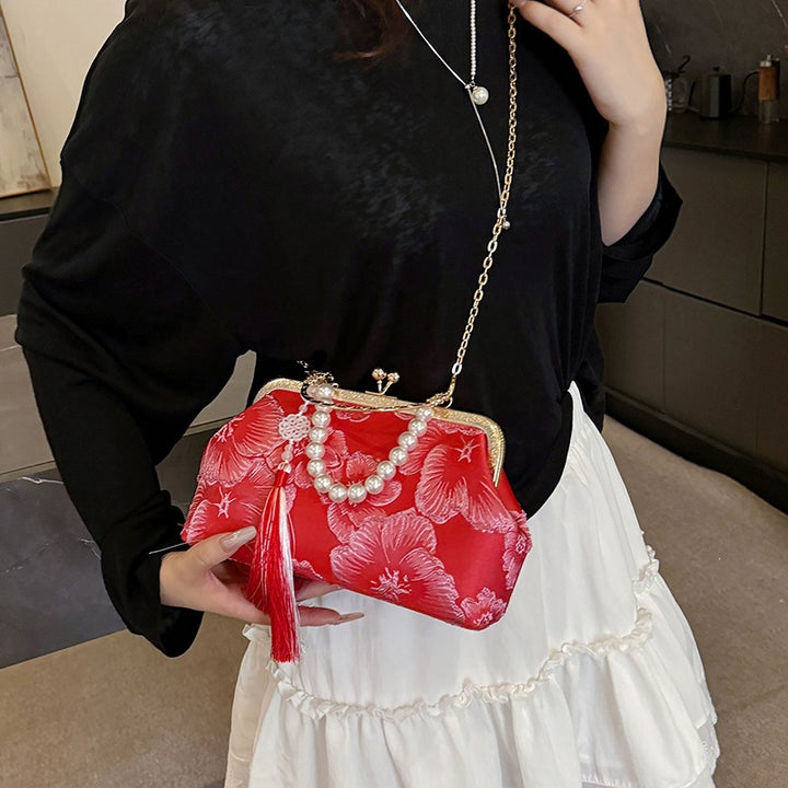 Damen elegante Abendtasche mit floralem Design und attraktiver Kettenakzent Nord Taschen