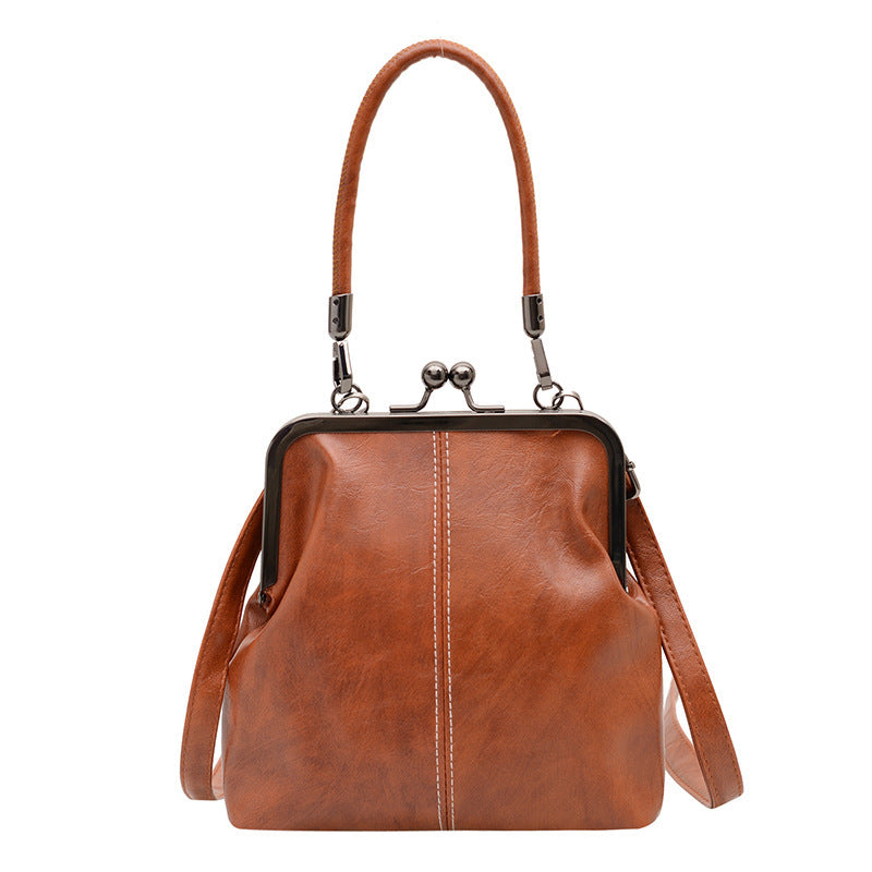 Damen elegante Handtasche mit robustem Metallverschluss Nord Taschen