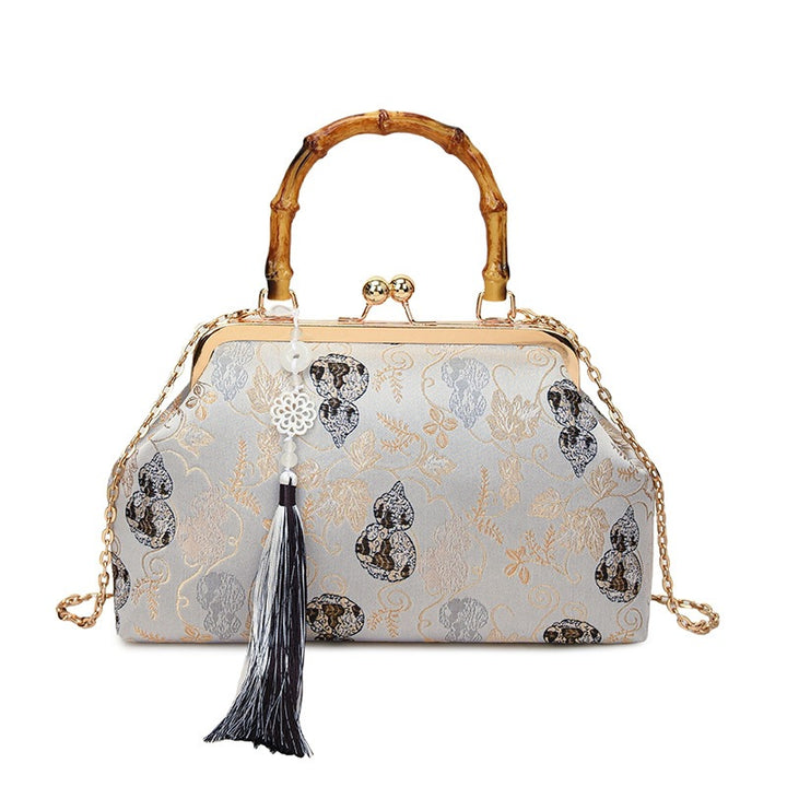 Damen elegante Handtasche mit Bambusgriffen und floralem Design Nord Taschen