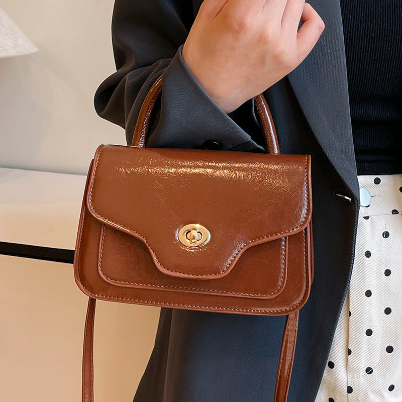 Damen Handtasche mit hochwertigem Kunstleder und elegantem Klappenverschluss Nord Taschen