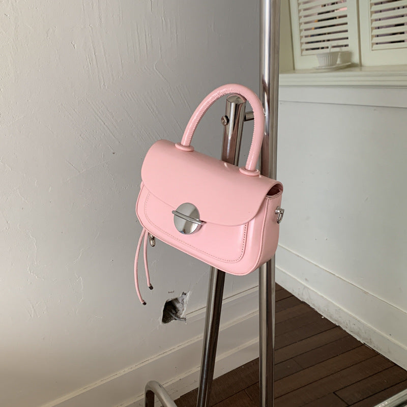 Damenhandtasche mit abnehmbarem Schulterriemen und glänzendem Verschluss Nord Taschen