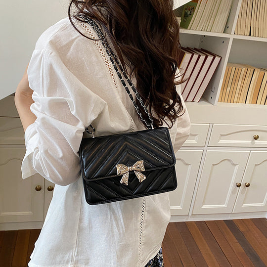 Damen Designer-Handtasche mit strukturiertem Karomuster und stilvollem Kettenverschluss Nord Taschen