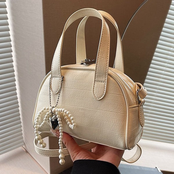 Damen Mini-Handtasche mit stilvollem Krokodil-Look und abnehmbarem Anhänger | Nord Taschen
