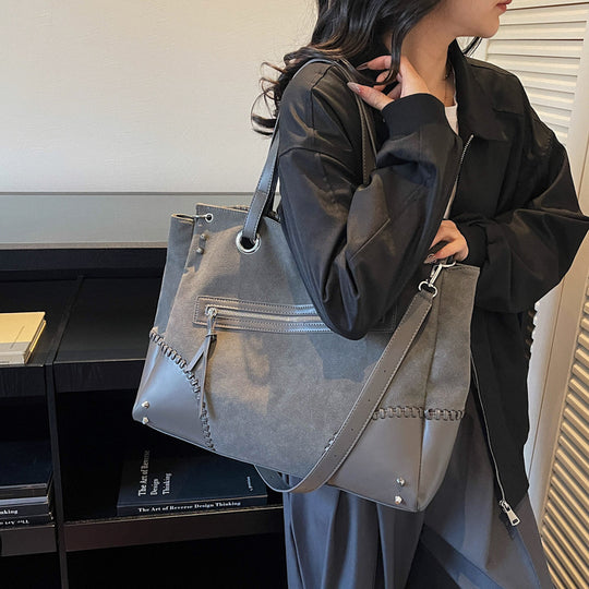 Damen elegante Handtasche mit offenen Seiten und dezenten Lederdetails Nord Taschen