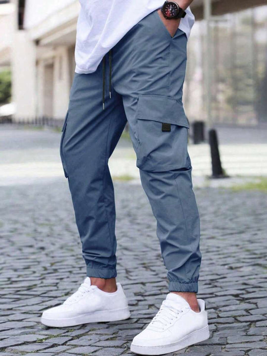 Herren technische Travel-Joggerhose mit integriertem Sicherheitsfach elastischem Tunnelzugbund und wasserabweisender Beschichtung Nord Taschen