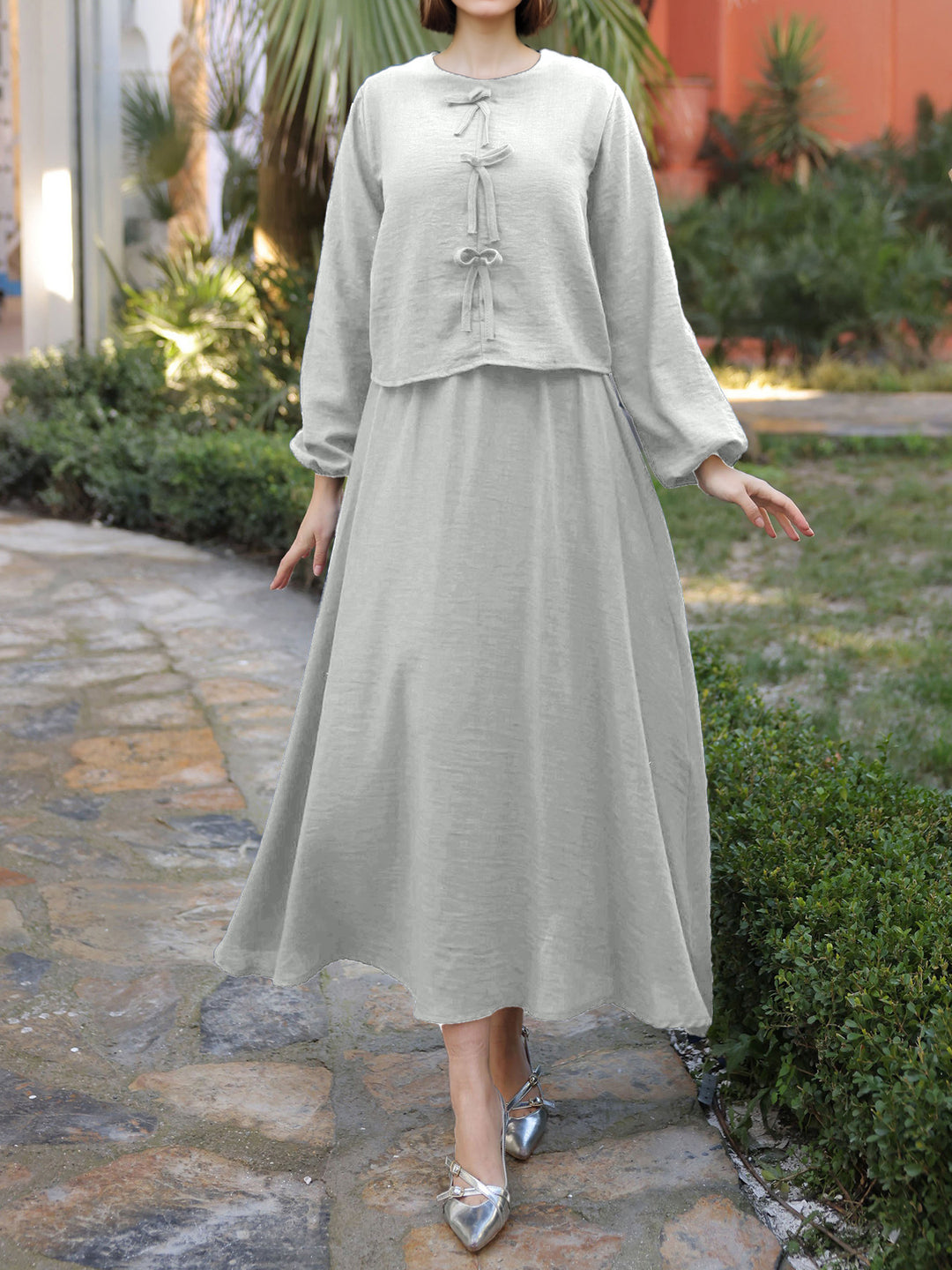 Damen Elegantes Langarmkleid mit Schößchen Nord Taschen