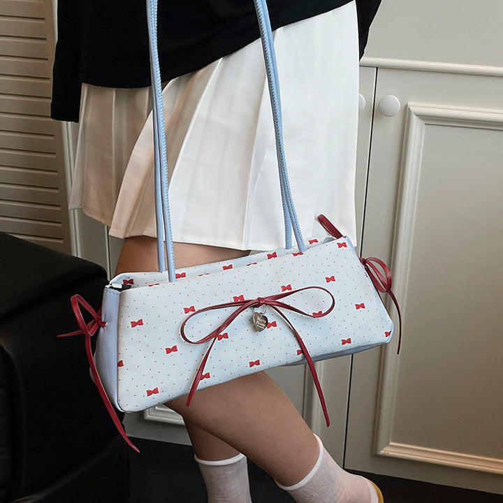 Damen Handtasche mit verschnörkeltem Schleifen-Design Nord Taschen