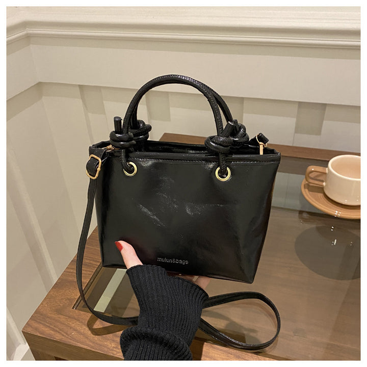 Damen Handtasche mit geflochtenem Tragegriff Nord Taschen