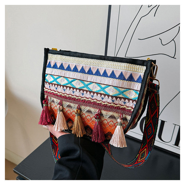 Damen umhängetasche mit kreativem Stickmuster und Quasten Nord Taschen