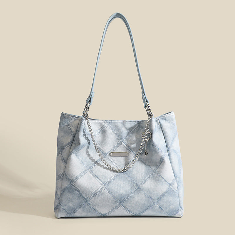 Damen Tragetasche mit schickem Zebramuster und eleganten Kettenakzenten Nord Taschen