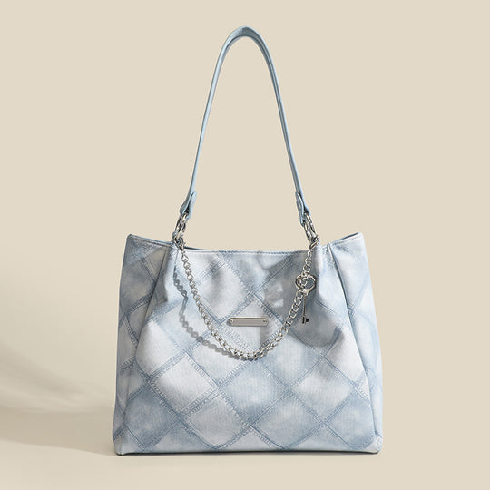 Damen Tragetasche mit schickem Zebramuster und eleganten Kettenakzenten Nord Taschen