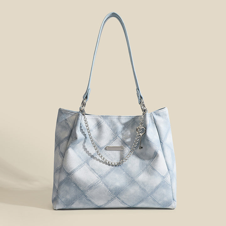 Damen Tragetasche mit schickem Zebramuster und eleganten Kettenakzenten Nord Taschen