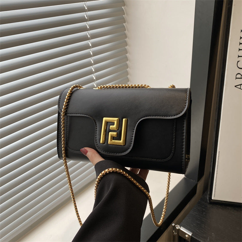 Damen elegante Umhängetasche mit goldenen Akzenten Nord Taschen