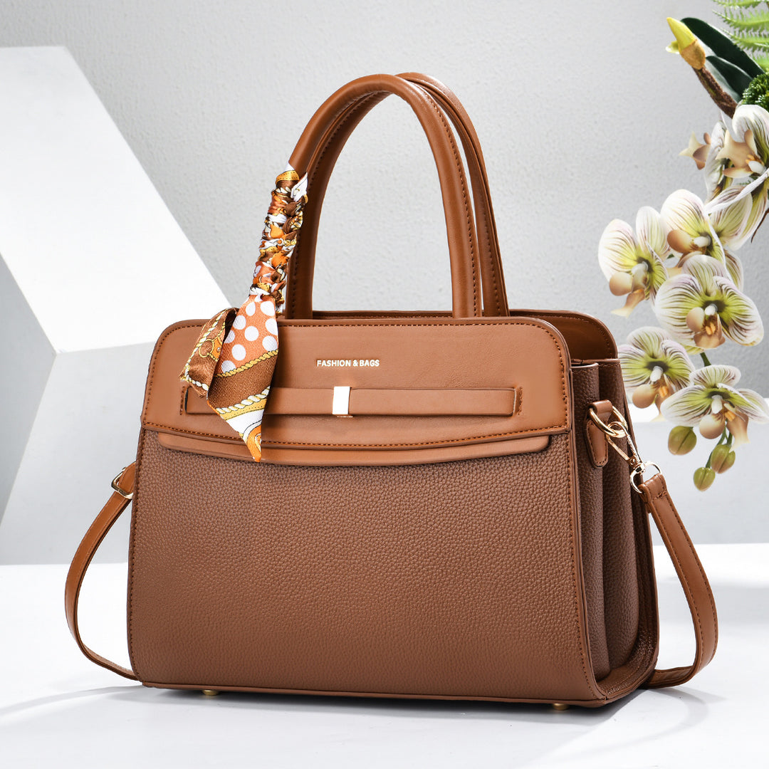 Damen elegante Handtasche mit praktischen Fächern und verspieltem Schal Nord Taschen