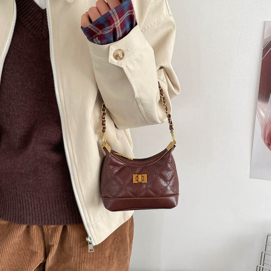 Damen stilvolle Umhängetasche aus glänzendem Kunstleder mit eleganter Kettenakzent Nord Taschen