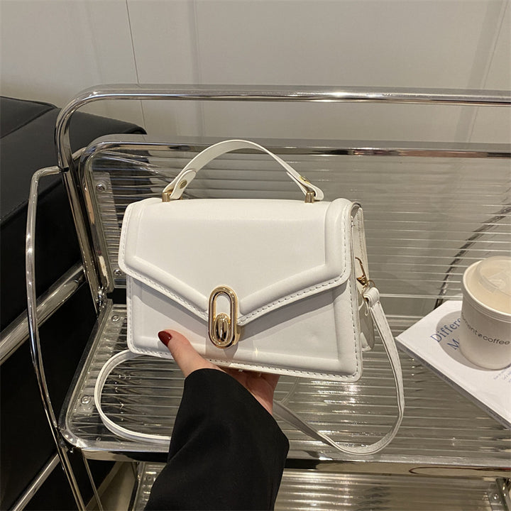 Damen Elegante Handtasche mit goldenen Akzenten Nord Taschen