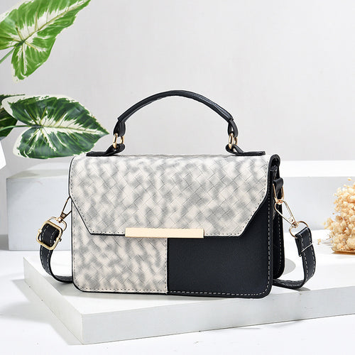 Damen modische Umhängetasche mit strukturiertem Design und goldenen Akzenten Nord Taschen