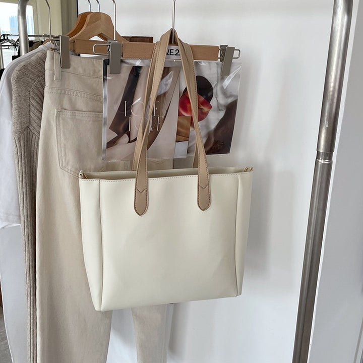 Damen elegante Tragetasche mit verspieltem Schnitt Nord Taschen
