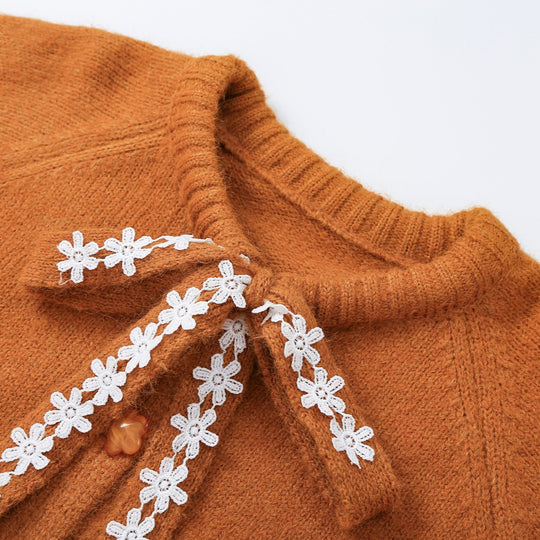 Damen Grobstrick‑Pullover mit floraler Spitzenkordel am Ausschnitt Nord Taschen