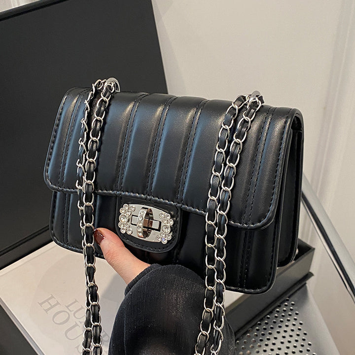 Damen Umhängetasche mit gestepptem Design und elegantem Verschluss Nord Taschen