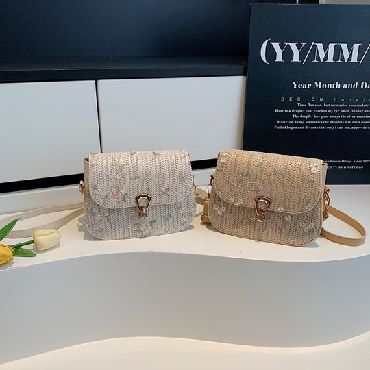 Damen elegante Umhängetasche mit floralen Akzenten Nord Taschen