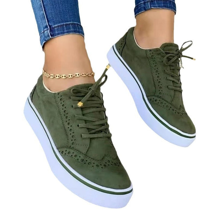 Damen Sneaker im eleganten Design mit klassischer Brogue-Detailierung