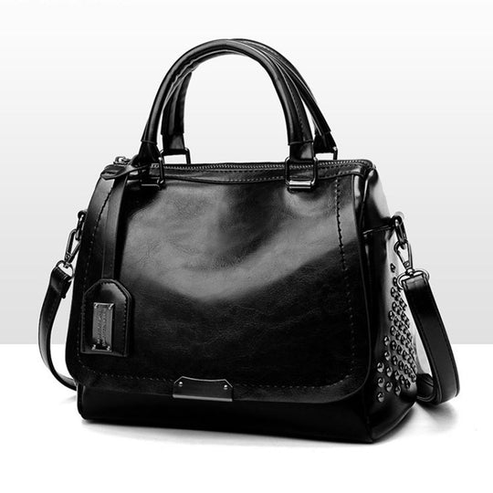 Damen schicke Handtasche aus Kunstleder mit Nietenverzierung Nord Taschen