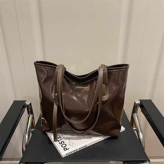 Damen elegante Ledereinkaufstasche mit schimmerndem Finish und abnehmbaren Schulterriemen Nord Taschen