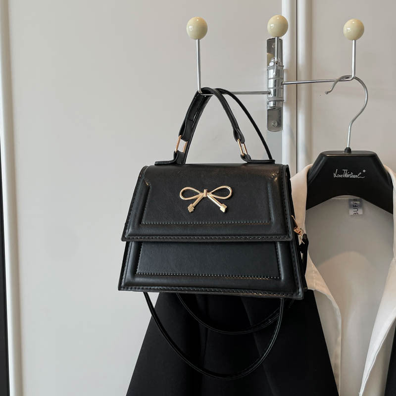 Damen elegante Handtasche mit verspieltem Schleifendesign Nord Taschen