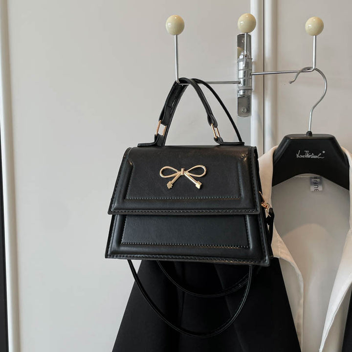 Damen elegante Handtasche mit verspieltem Schleifendesign Nord Taschen